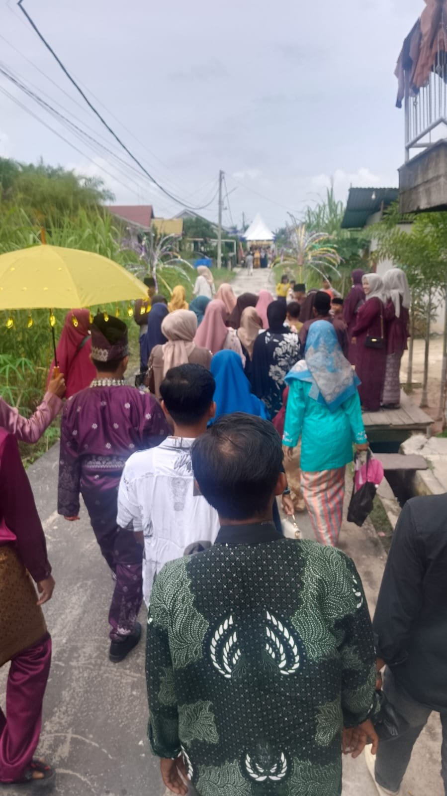 Prosesi pernikahan adat Melayu di Kota Dumai yang masih dilestarikan masyarakat sebagai warisan budaya.